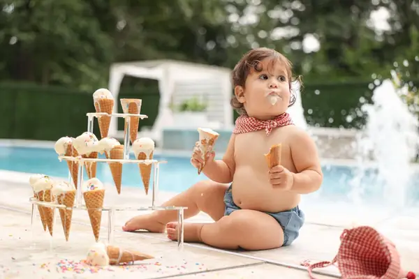 Toddler with ice cream cones by the pool, outdoor family photography by Photoholic, Rockland County NY